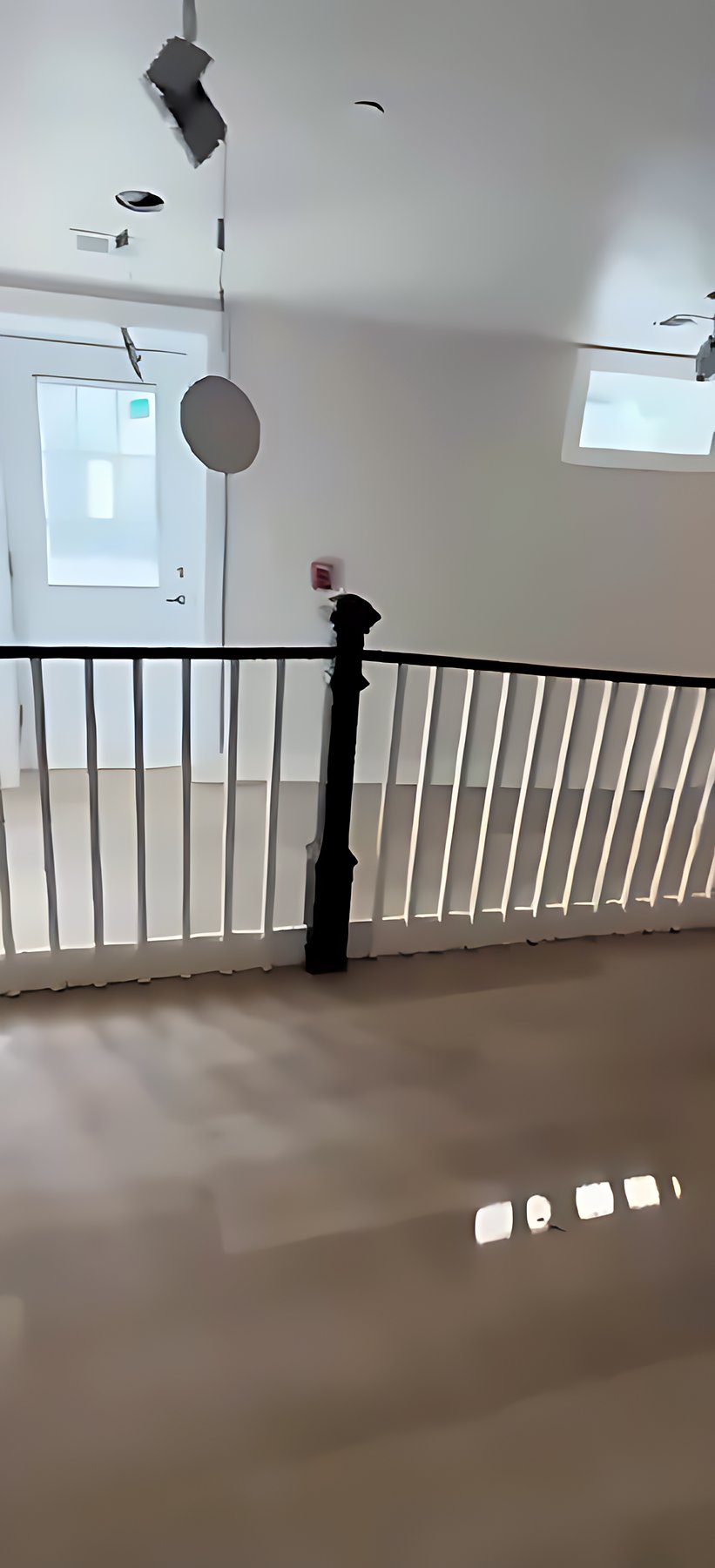 Upstairs landing with new wide-plank flooring