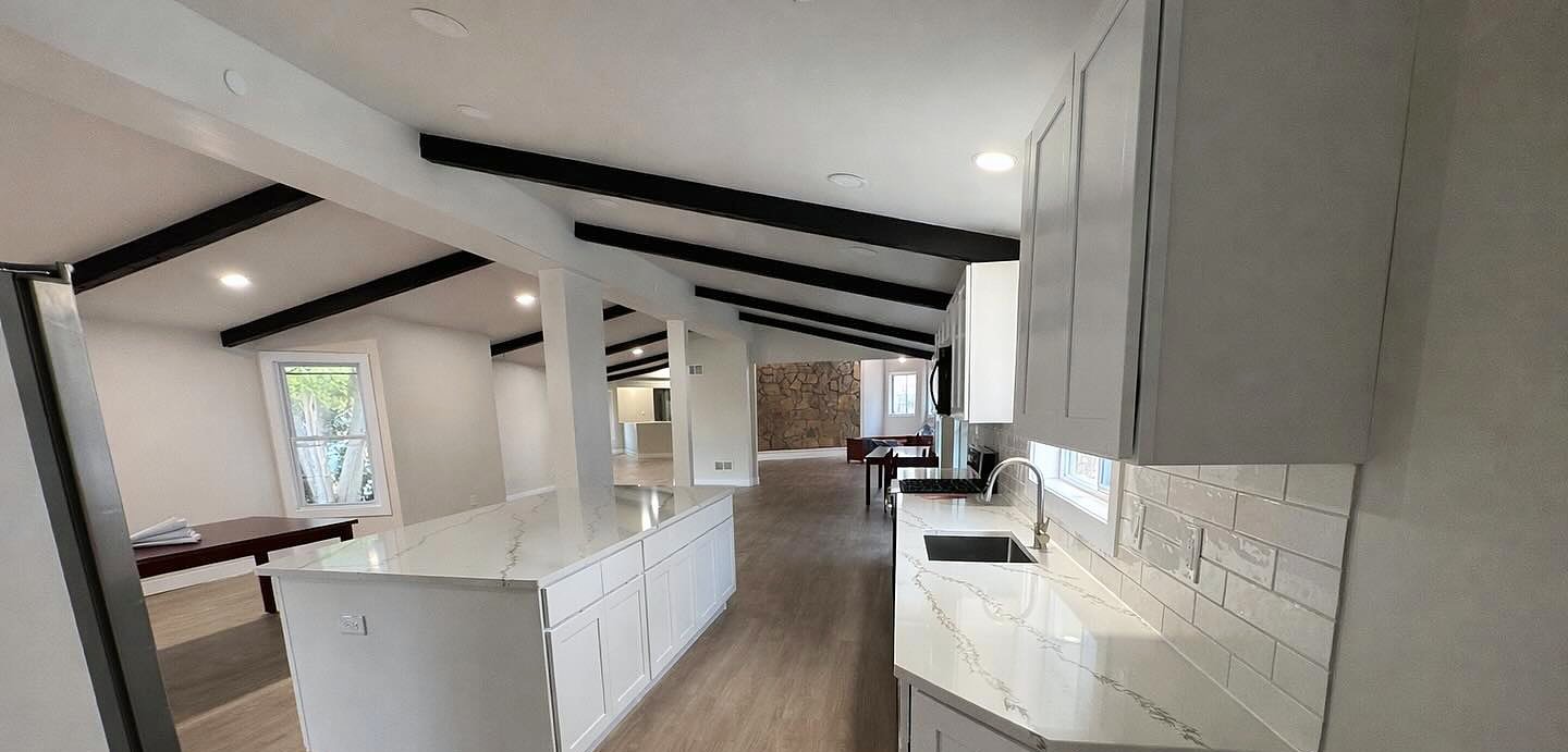 White kitchen with a large island